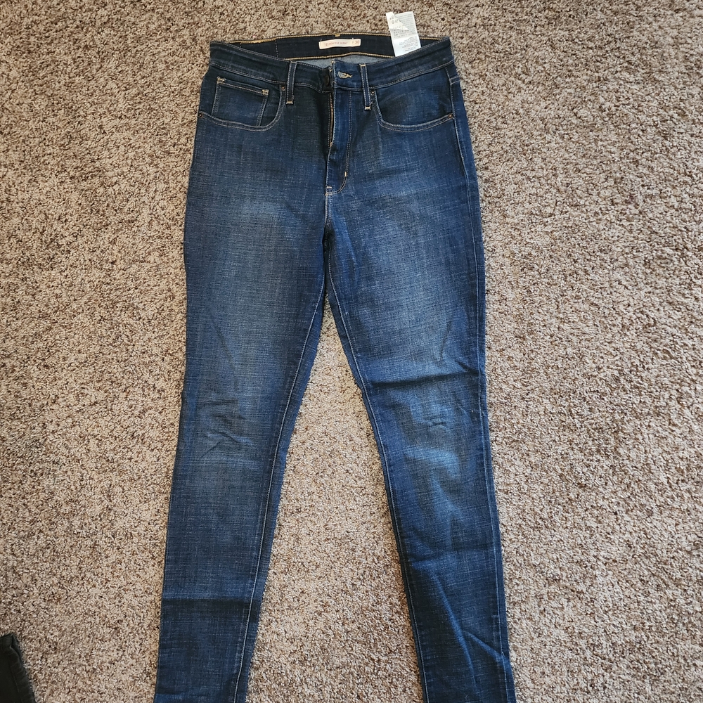 Levi's 721 High Rise Blue Skinny Jeans with Stretch and Faded Details